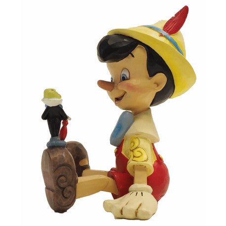 figura-enesco-disney-pinocchio-sentado-&-pepito-grillo